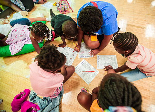 Campers at the Harold Mezile North Community Y problem solving.