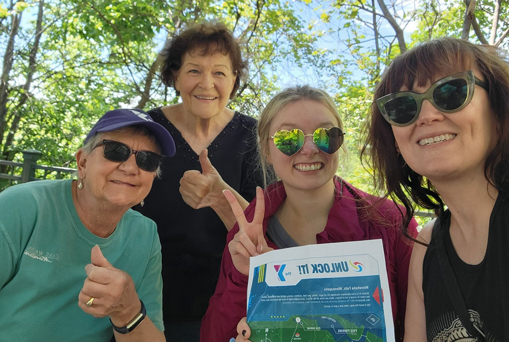 Nancy Simpson (far right) leading a group of Unlock It! adventure participants.