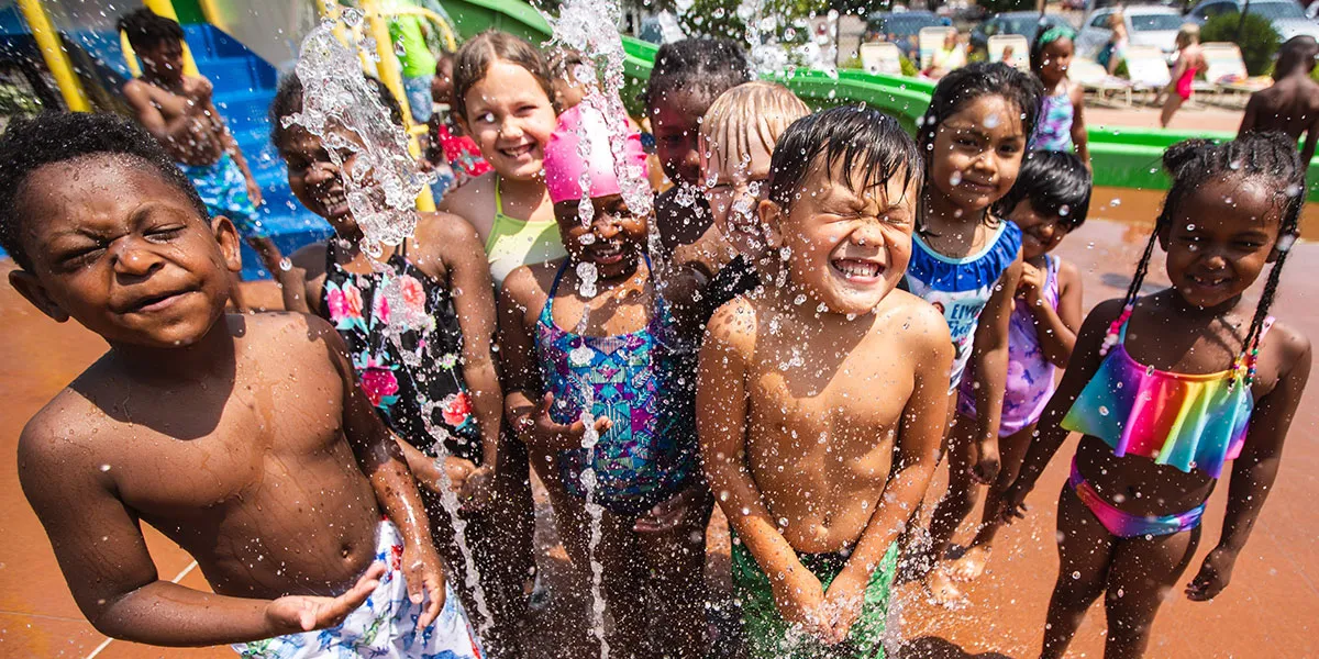 YMCA summer program participants at splash pad