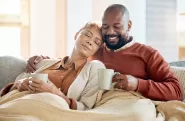 Couple relaxing on couch