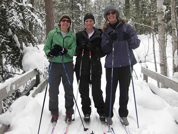 Enjoying the magic of winter camping are (left to right) Shannon Thompson, Ellie Zuehlke &amp; Heather Logelin