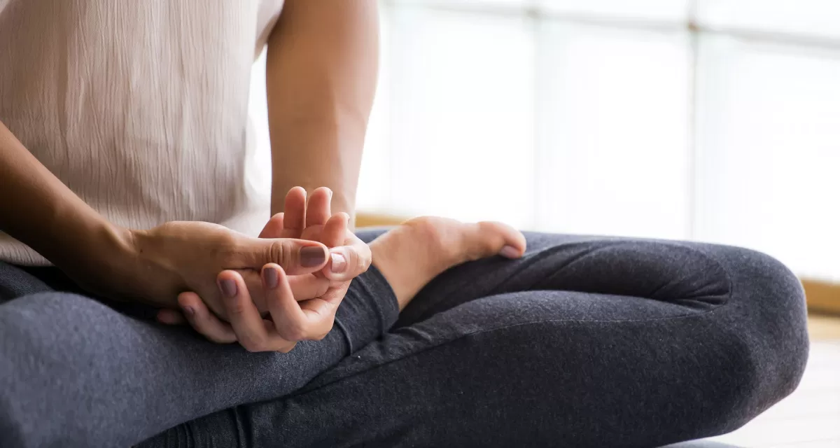 Person sitting in meditation