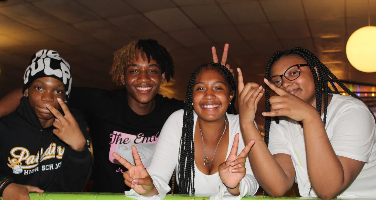 Teens smiling for the camera