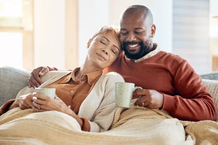 Couple relaxing on couch