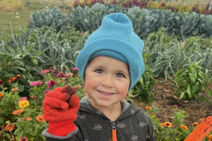 young girl gardening