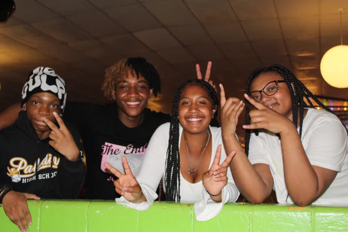 Teens smiling for the camera