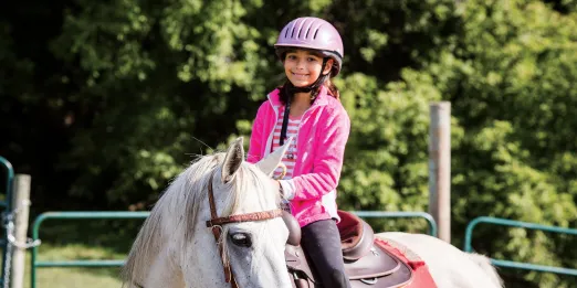 Girl riding a horse