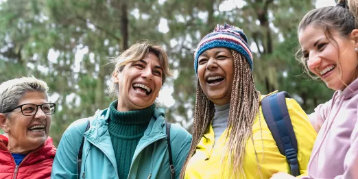 Women laughing together outdoors