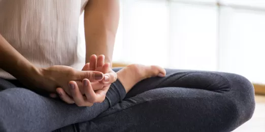 Person sitting in meditation